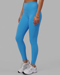 Woman wearing Elixir Ultra High-Rise Full Length Legging Pockets - Azure Blue