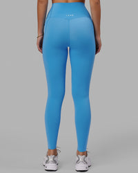 Woman wearing Elixir Ultra High-Rise Full Length Legging Pockets - Azure Blue
