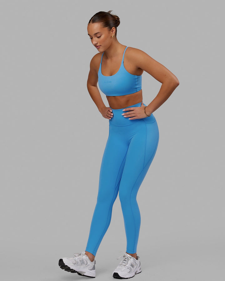 Woman wearing Elixir Full Length Tights With Pockets - Azure Blue