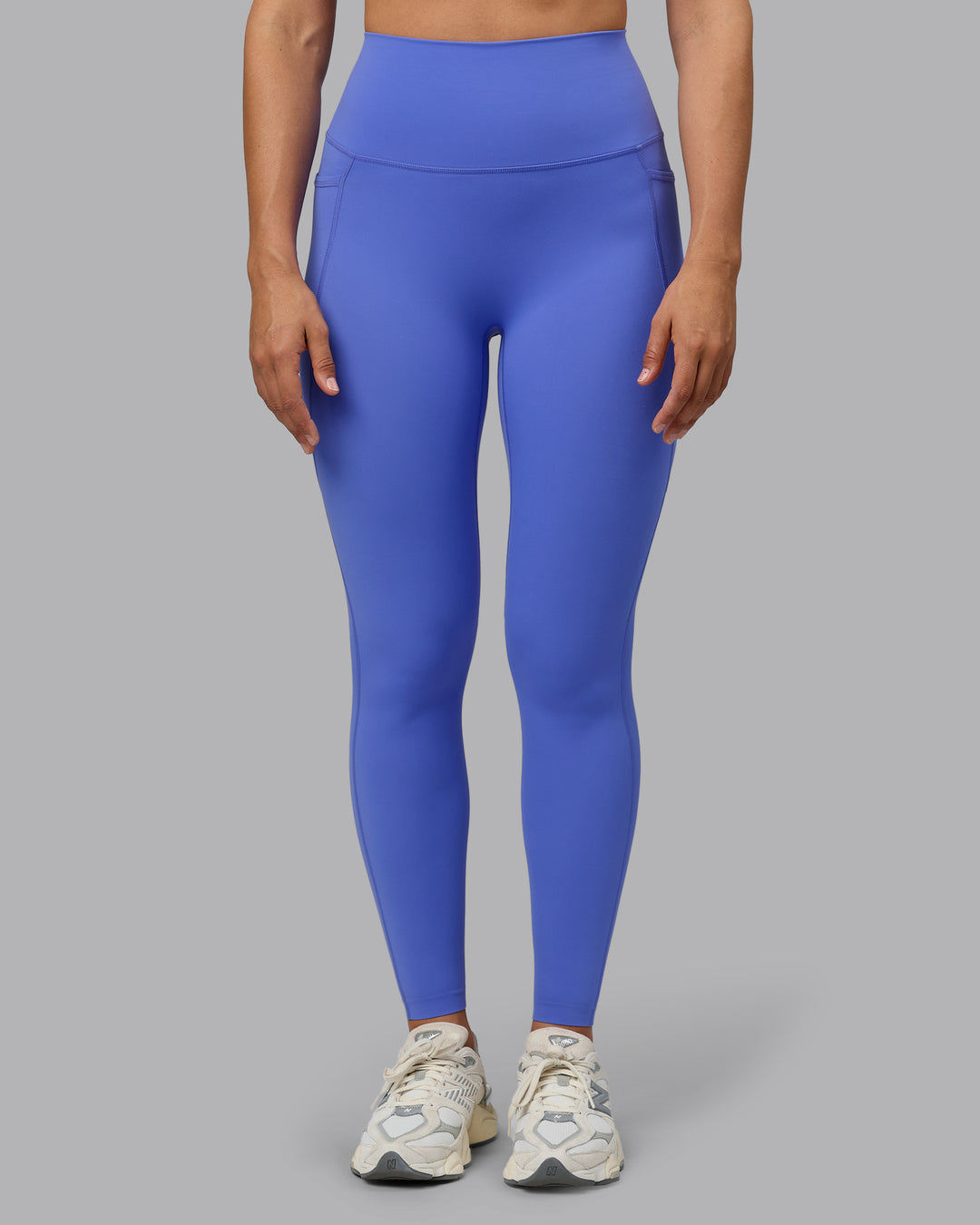 Woman wearing Elixir Ultra High-Rise Full Length Legging Pockets - Baja Blue