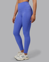 Woman wearing Elixir Ultra High-Rise Full Length Legging Pockets - Baja Blue