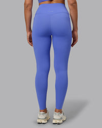Woman wearing Elixir Ultra High-Rise Full Length Legging Pockets - Baja Blue