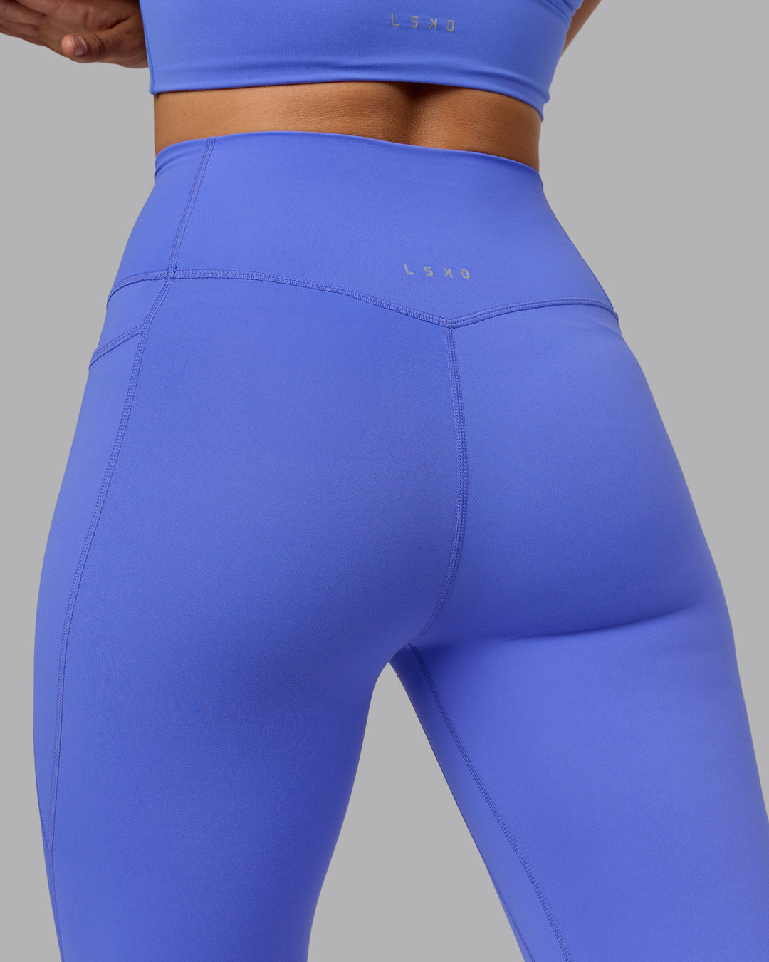 Woman wearing Elixir Ultra High-Rise Full Length Legging Pockets - Baja Blue