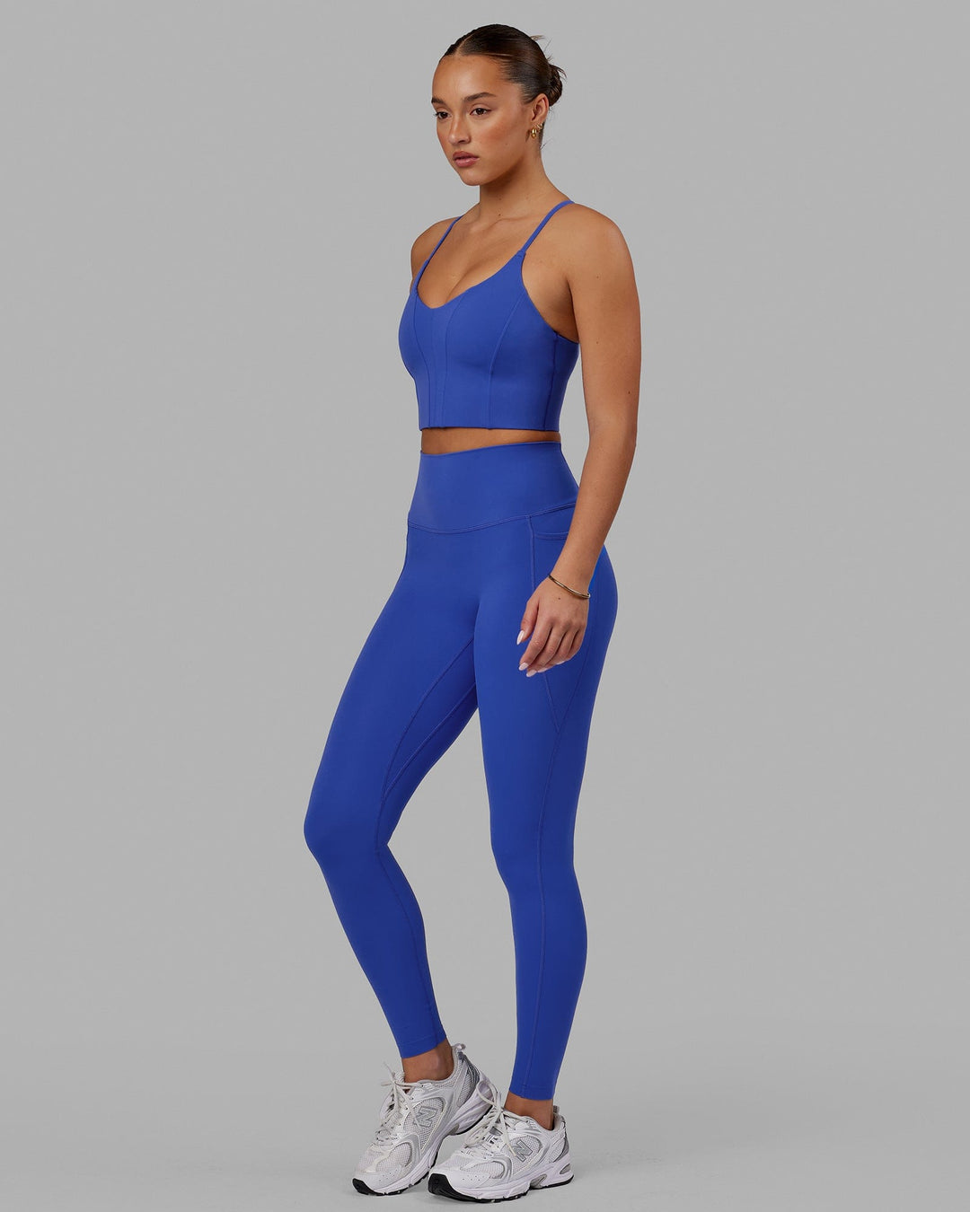 Woman wearing Elixir Ultra High-Rise Full Length Legging Pockets - Power Cobalt