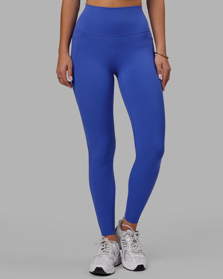 Woman wearing Elixir Full Length Tight With Pockets - Power Cobalt