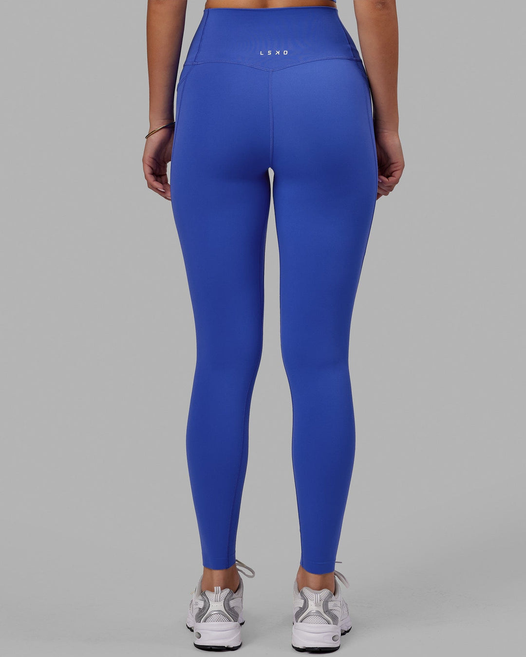 Woman wearing Elixir Ultra High-Rise Full Length Legging Pockets - Power Cobalt
