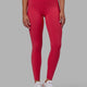 Woman wearing Elixir Full Length Tights With Pockets - Raspberry