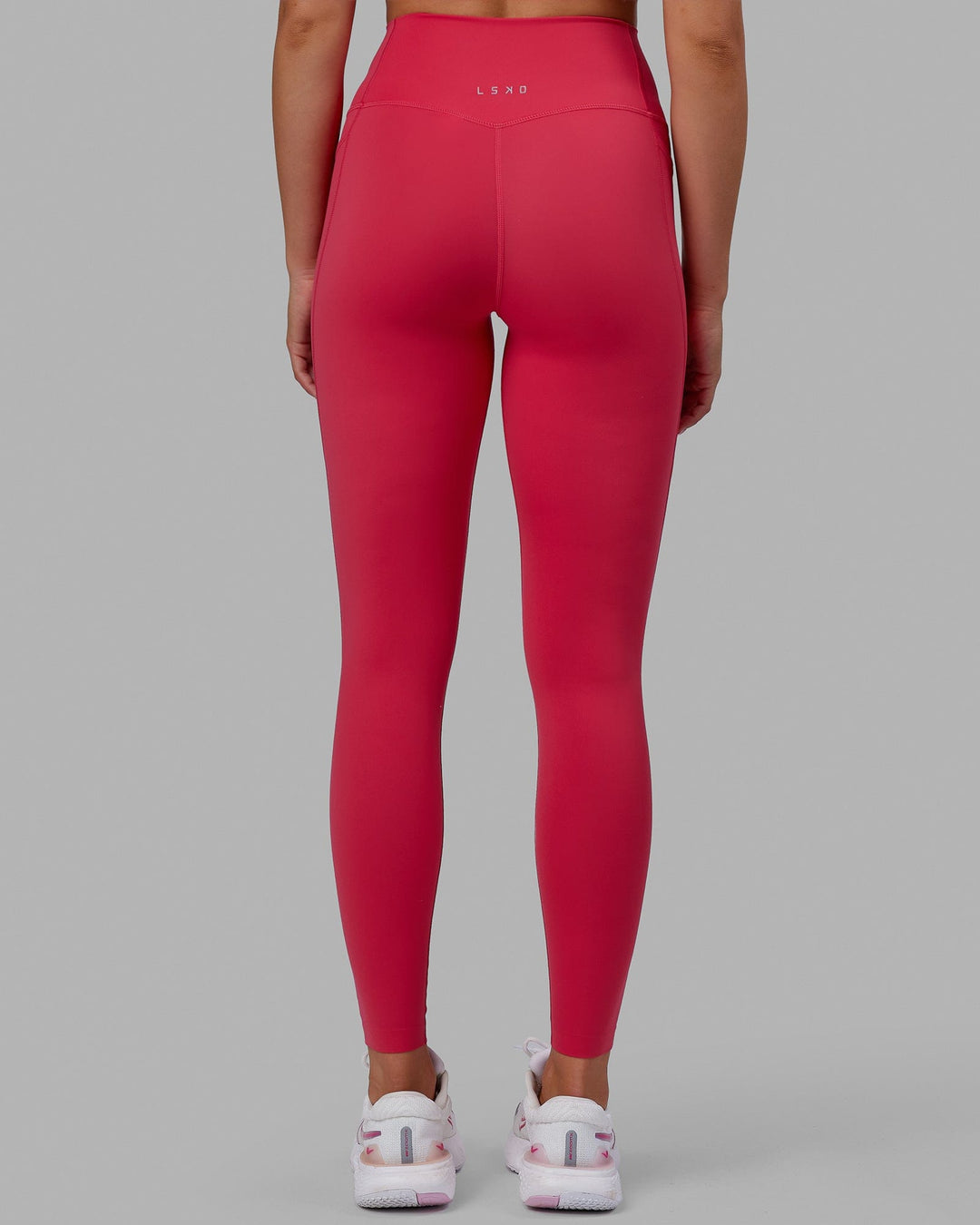 Woman wearing Elixir Full Length Tights With Pockets - Raspberry