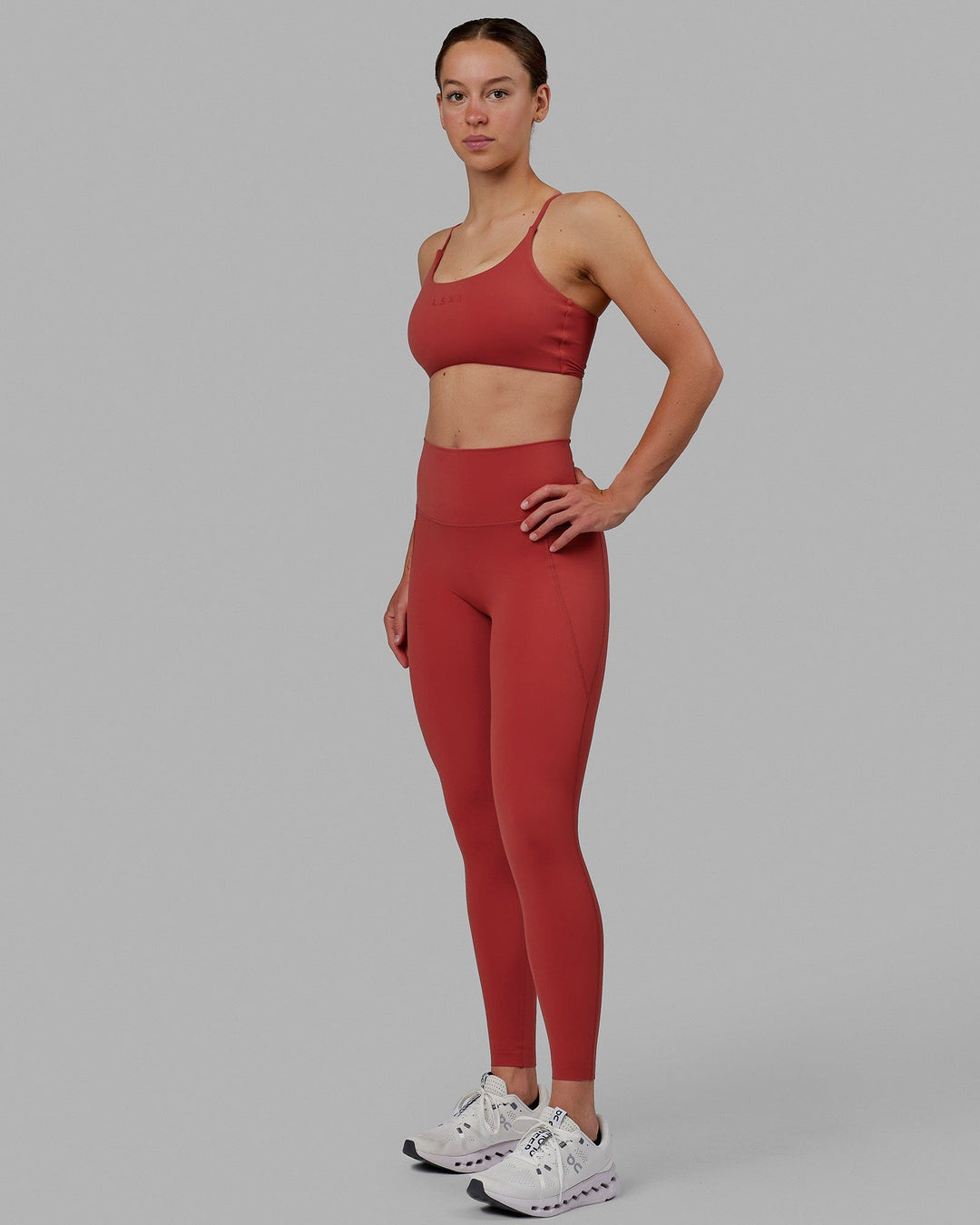 Woman wearing Elixir Full Length Tights With Pockets - Cardinal