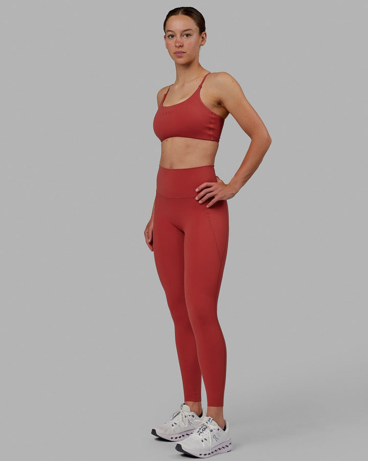 Woman wearing Elixir Full Length Tights With Pockets - Cardinal
