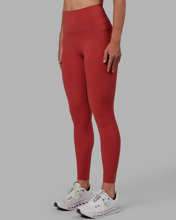 Woman wearing Elixir Full Length Tights With Pockets - Cardinal