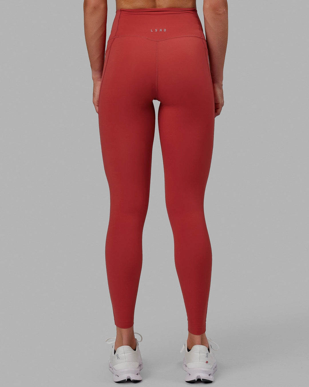 Woman wearing Elixir Full Length Tights With Pockets - Cardinal
