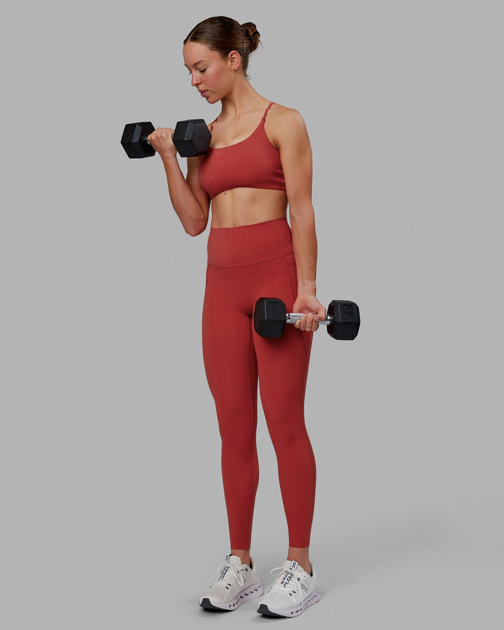 Woman wearing Elixir Full Length Tights With Pockets - Cardinal