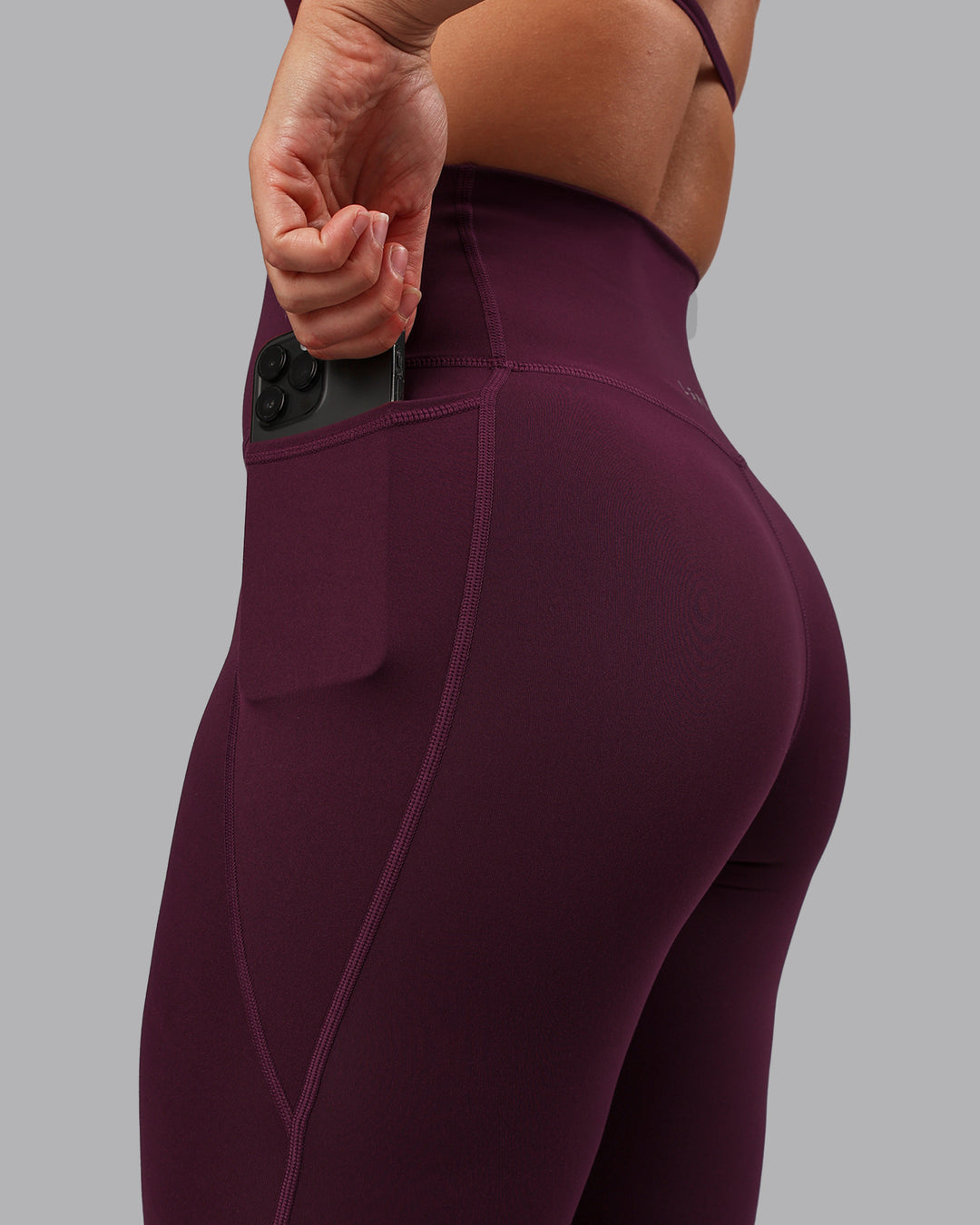 Woman wearing Elixir Ultra High-Rise Full Length Legging Pockets - Cherry Lacquer