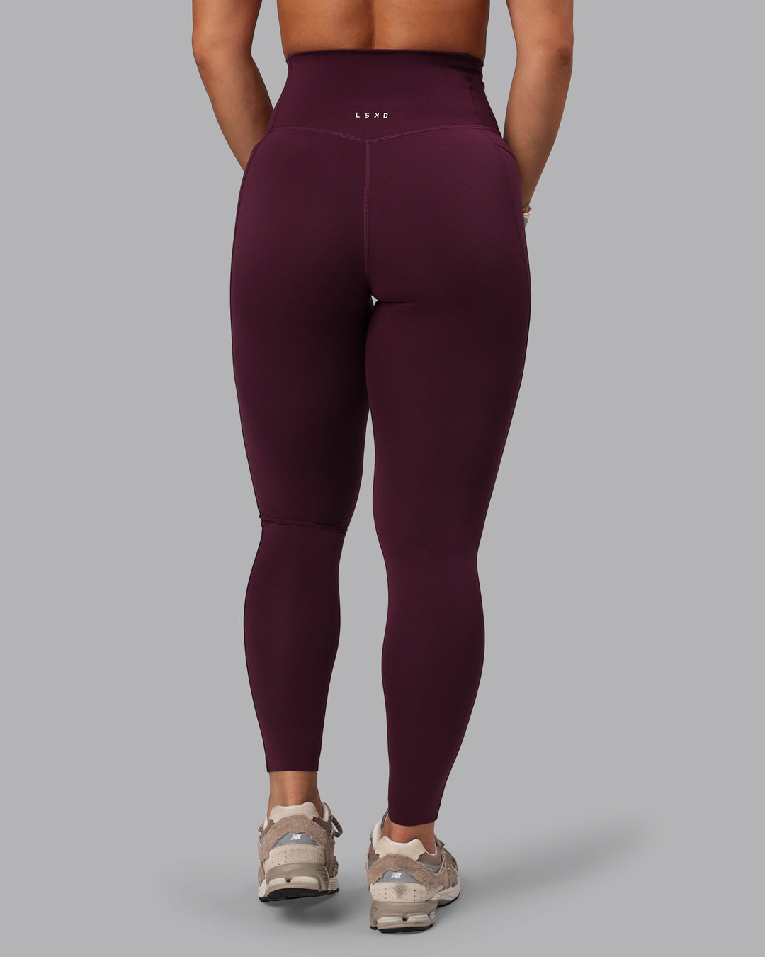 Woman wearing Elixir Ultra High-Rise Full Length Legging Pockets - Cherry Lacquer