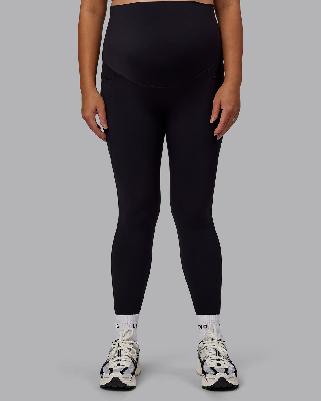 Woman wearing Elixir Ultra High-Rise Maternity Full Length Legging Pockets - Black | Model:Jojo | Size:M