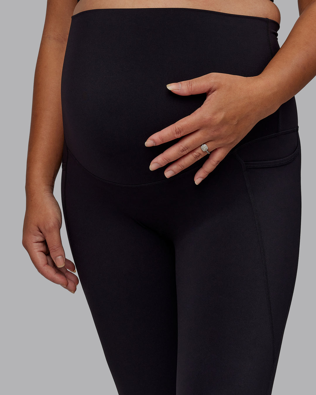 Woman wearing Elixir Ultra High-Rise Maternity Full Length Legging Pockets - Black | Model:Jojo | Size:M