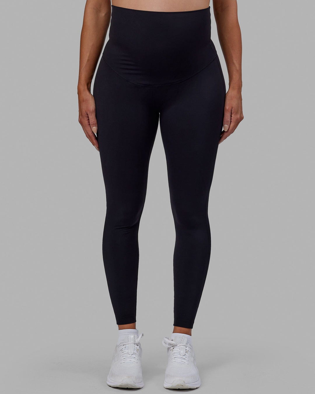 Woman wearing Elixir Ultra High-Rise Maternity Full Length Legging - Black | Model:Amanda | Size:S
