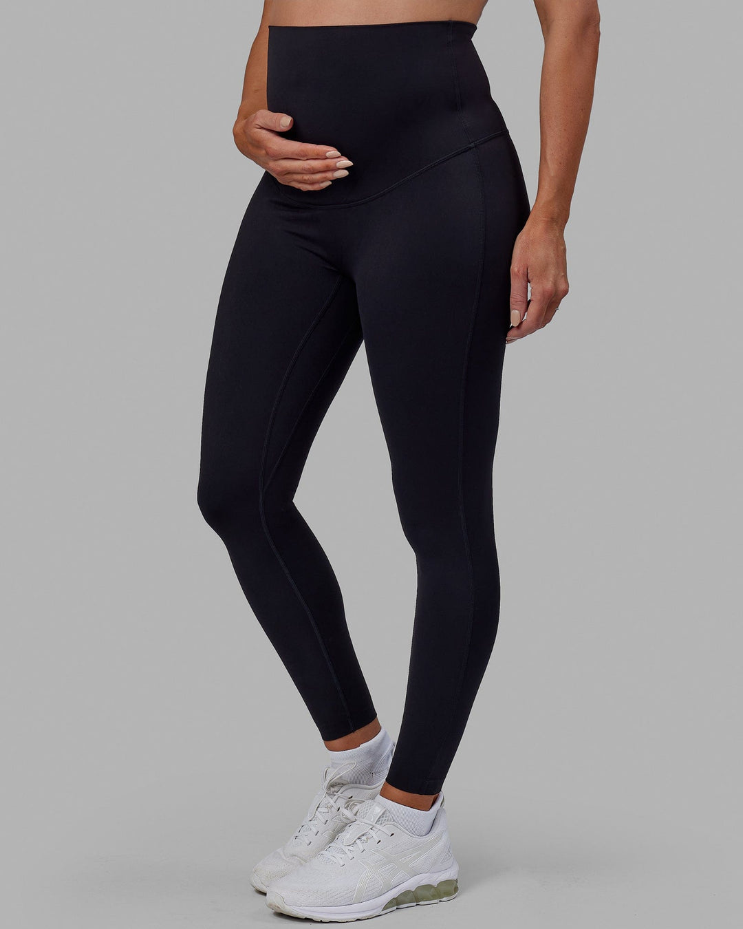 Woman wearing Elixir Ultra High-Rise Maternity Full Length Legging - Black | Model:Amanda | Size:S