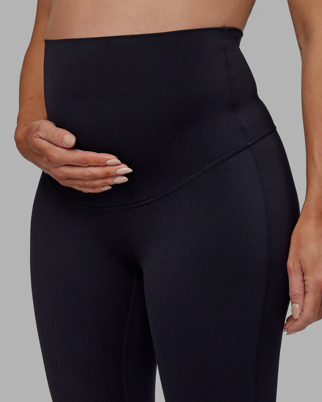 Woman wearing Elixir Ultra High-Rise Maternity Full Length Legging - Black | Model:Amanda | Size:S