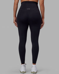Woman wearing Elixir Ultra High-Rise Maternity Full Length Legging - Black | Model:Amanda | Size:S