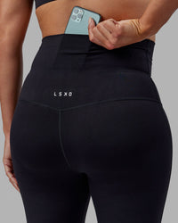 Woman wearing Elixir Ultra High-Rise Maternity Full Length Legging - Black | Model:Amanda | Size:S