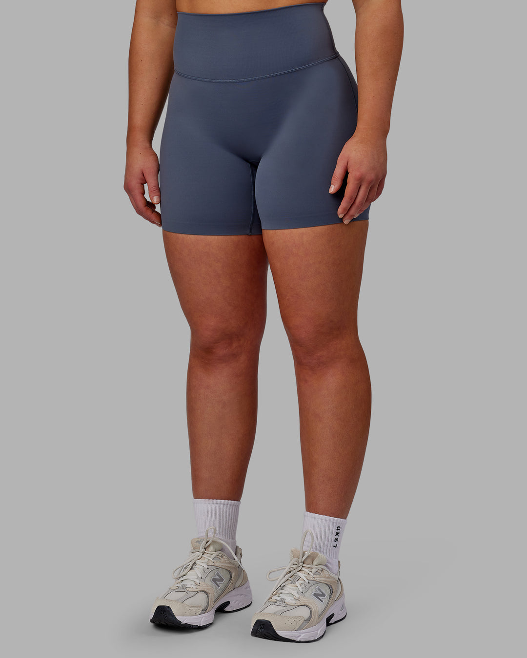 Woman wearing Elixir Ultra High-Rise 6" Short - Turbulence