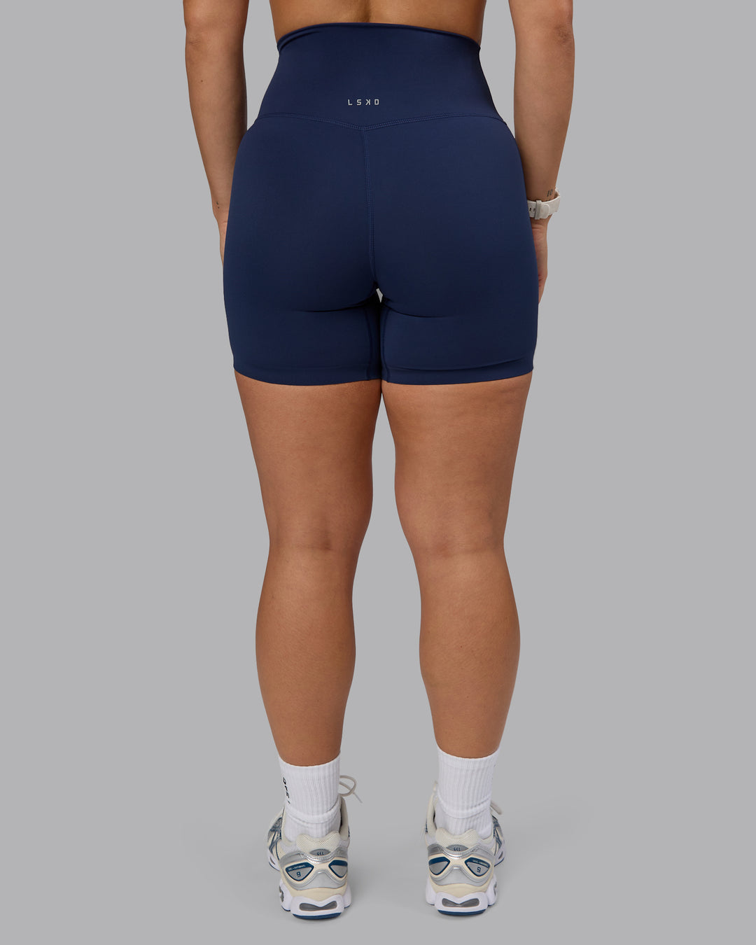 Woman wearing Elixir Ultra High-Rise 6&quot; Short - Future Navy  | Model:Lyss | Size:S