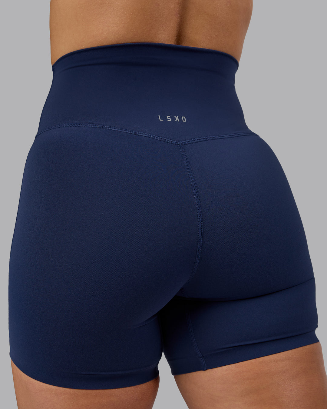 Woman wearing Elixir Ultra High-Rise 6&quot; Short - Future Navy  | Model:Lyss | Size:S