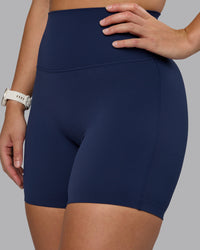 Woman wearing Elixir Ultra High-Rise 6" Short - Future Navy  | Model:Lyss | Size:S