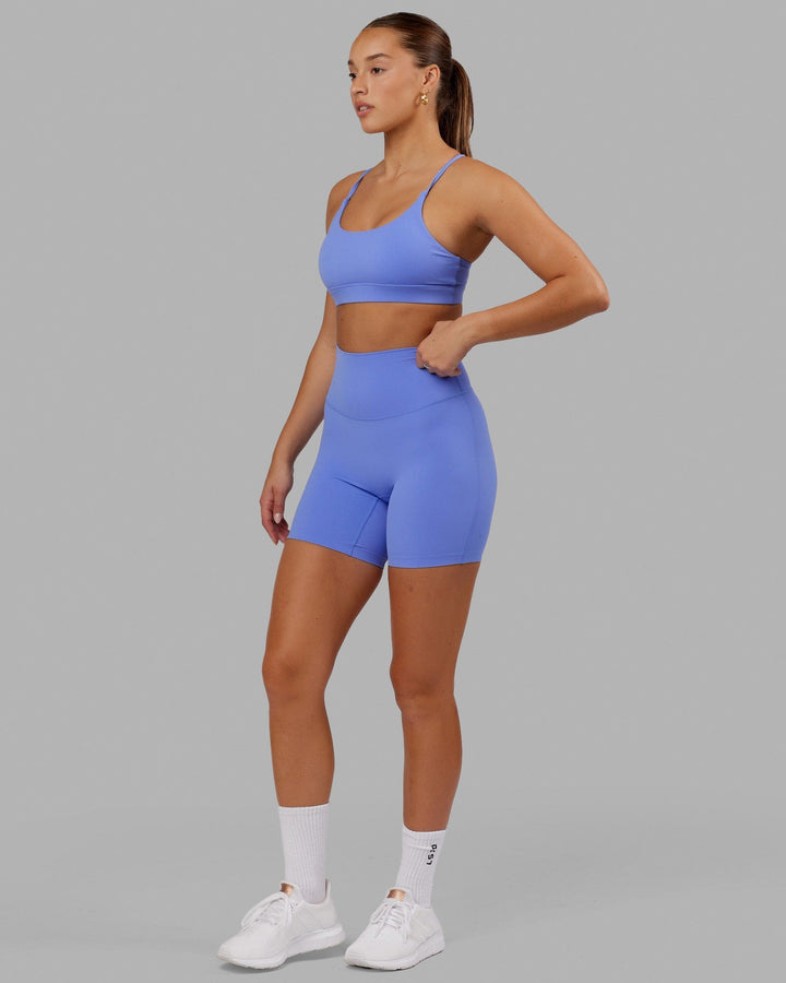 Woman wearing Elixir Mid Short Tight - Indulgent Blue