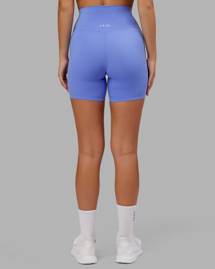 Woman wearing Elixir Mid Short Tight - Indulgent Blue