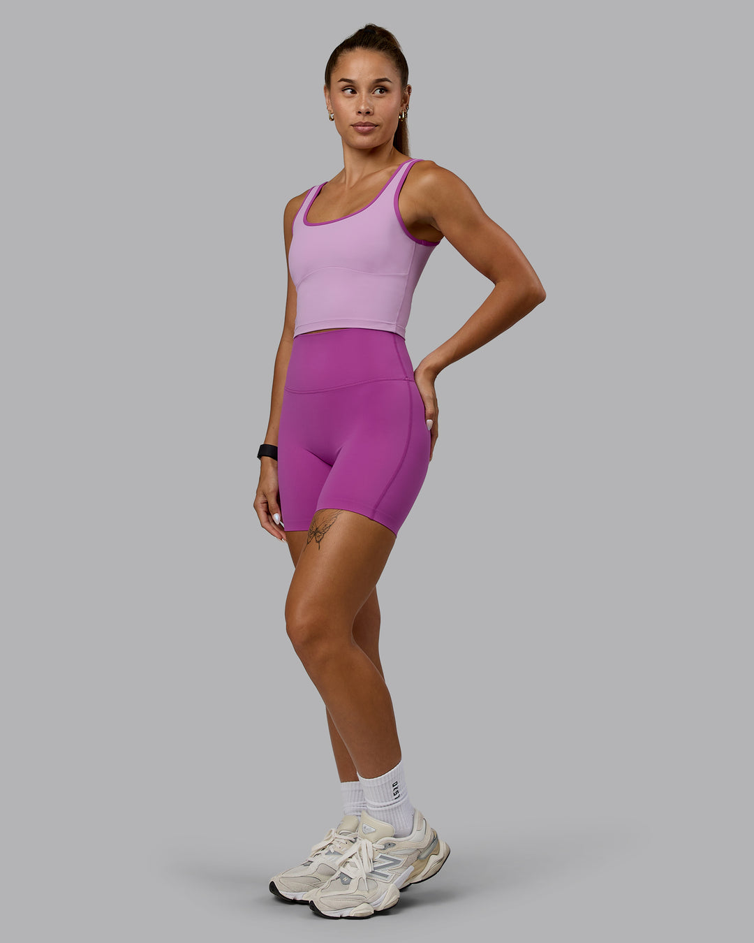 Woman wearing Elixir Ultra High-Rise 6&quot; Short - Orchid