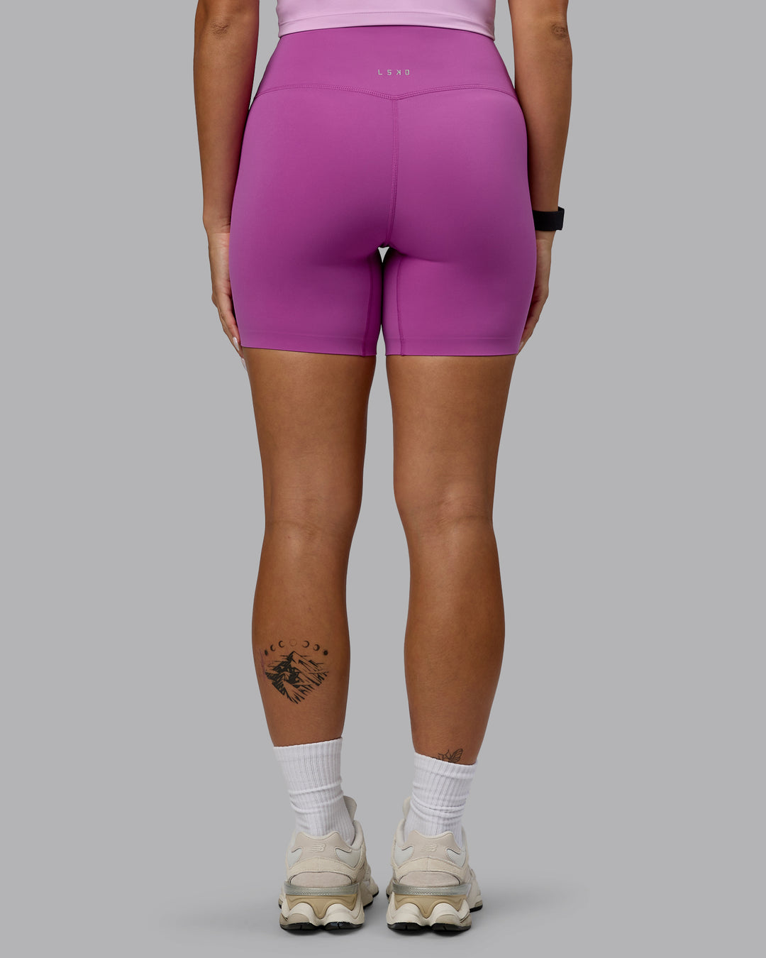 Woman wearing Elixir Ultra High-Rise 6&quot; Short - Orchid