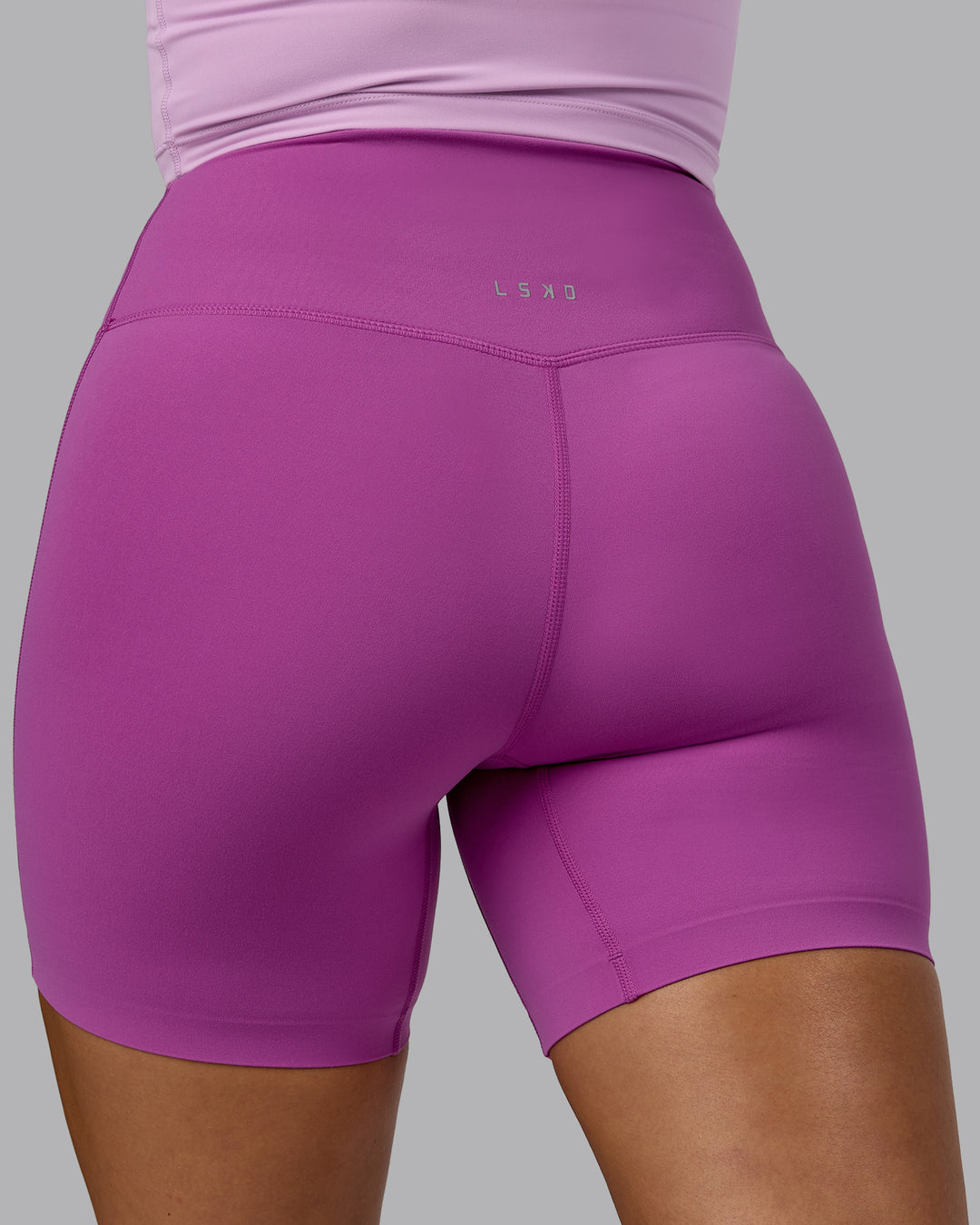 Woman wearing Elixir Ultra High-Rise 6&quot; Short - Orchid