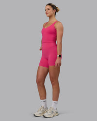 Woman wearing Elixir Ultra High-Rise 6" Short - Pink Flash