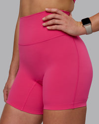 Woman wearing Elixir Ultra High-Rise 6" Short - Pink Flash