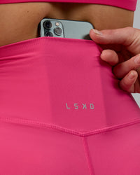Woman wearing Elixir Ultra High-Rise 6" Short - Pink Flash