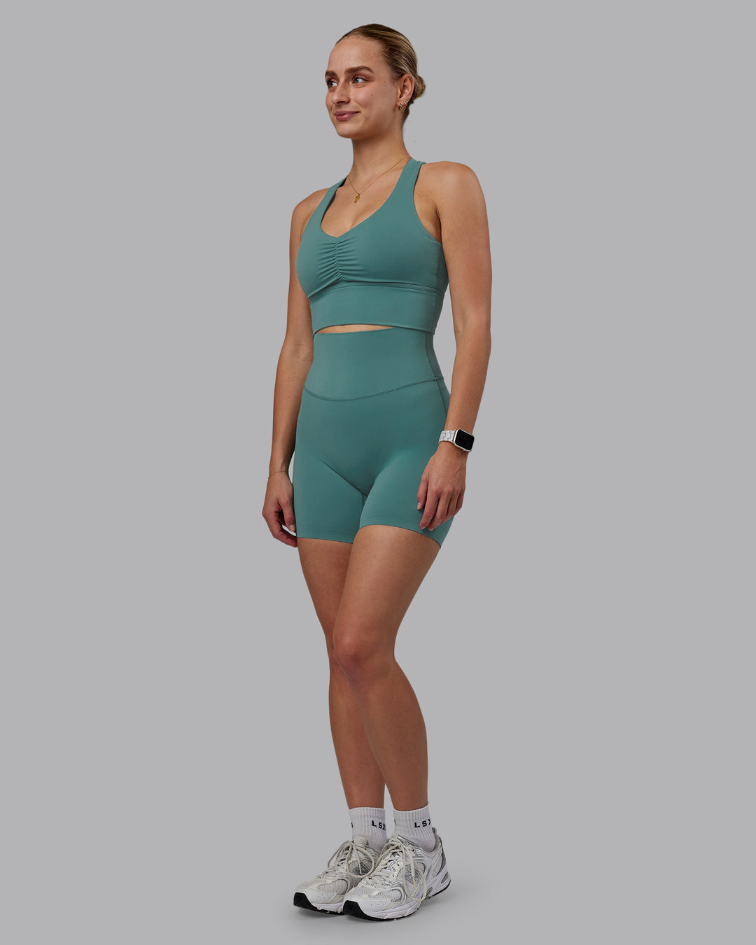 Woman wearing Elixir Ultra High-Rise 6&quot; Short - Sagebrush