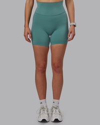 Woman wearing Elixir Ultra High-Rise 6" Short - Sagebrush