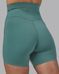 Woman wearing Elixir Ultra High-Rise 6" Short - Sagebrush