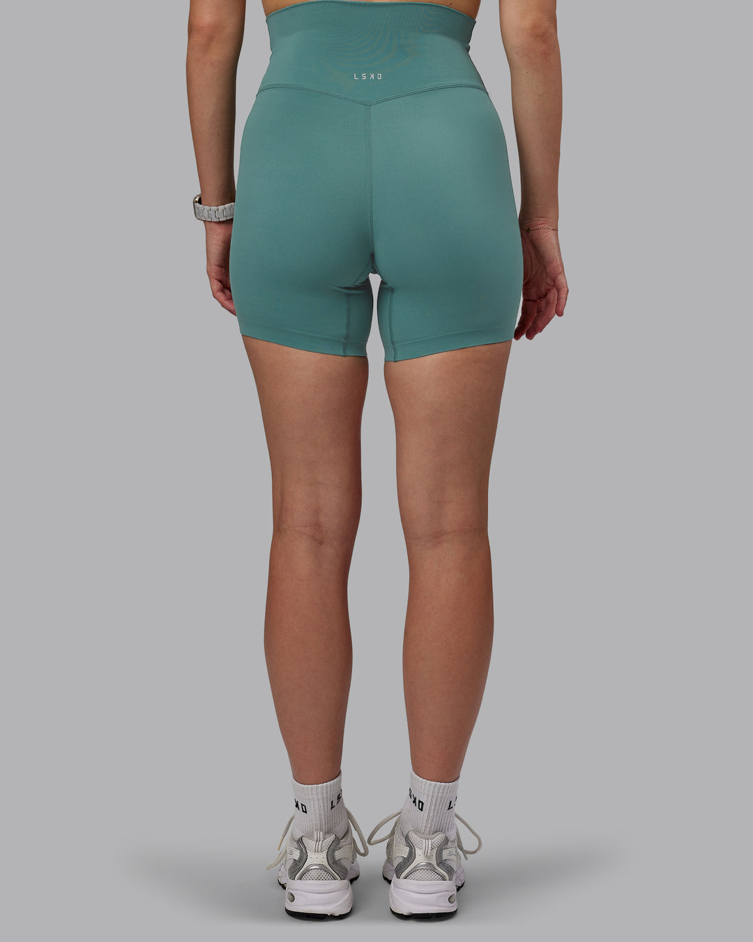 Woman wearing Elixir Ultra High-Rise 6&quot; Short - Sagebrush