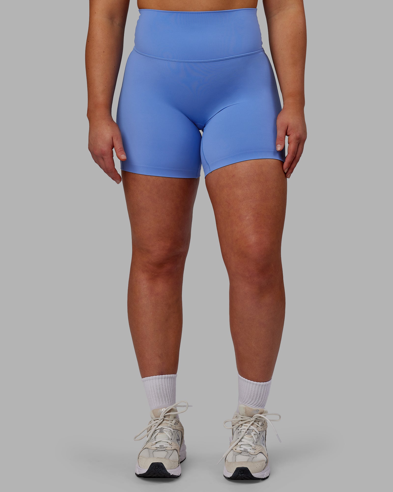 Woman wearing Elixir Ultra High-Rise 6" Short - Ultramarine
