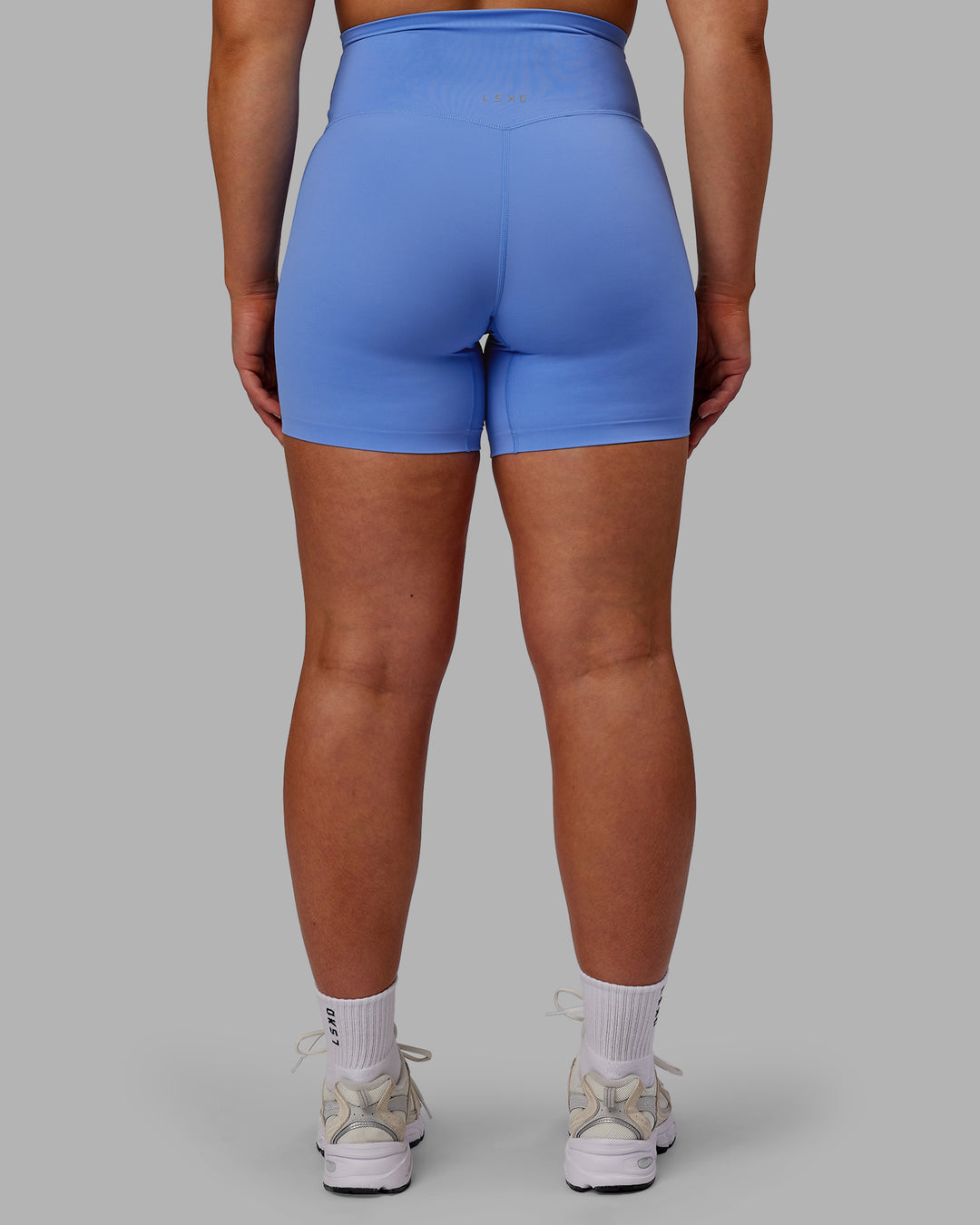 Woman wearing Elixir Ultra High-Rise 6&quot; Short - Ultramarine