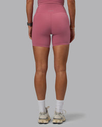 Woman wearing Elixir Ultra High-Rise 6" Short Pockets - Mauve Haze