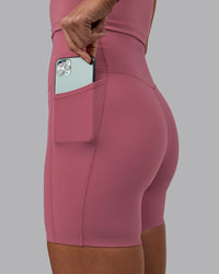 Woman wearing Elixir Ultra High-Rise 6" Short Pockets - Mauve Haze