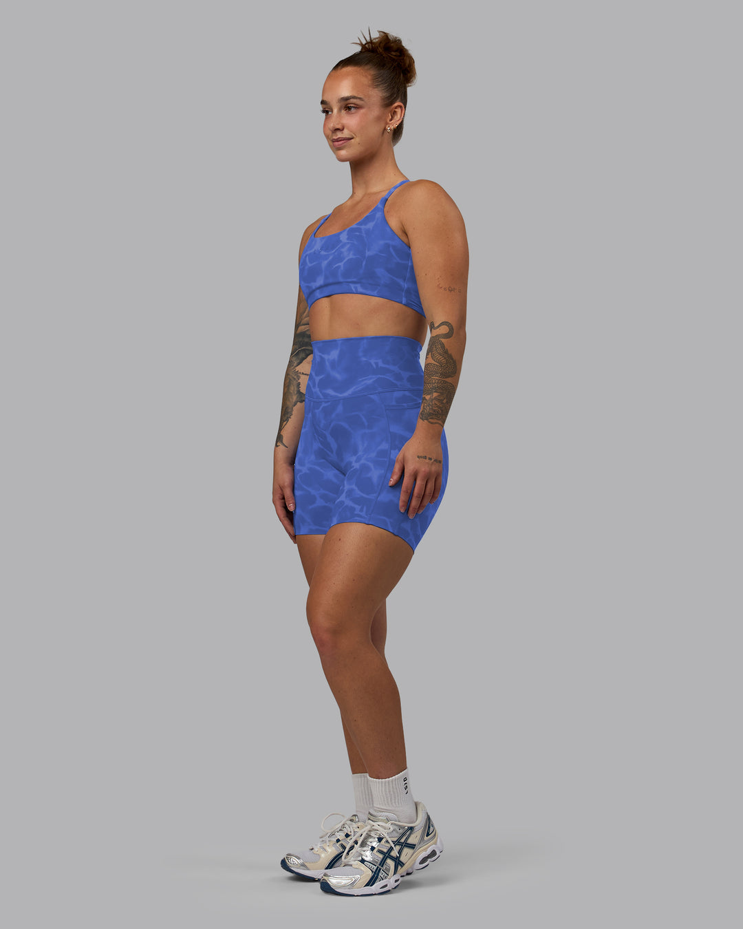 Woman wearing Elixir Ultra High-Rise 6&quot; Short Pockets - Tranquil-Power Cobalt