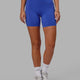 Woman wearing Elixir Mid Short Tight with Pockets - Power Cobalt