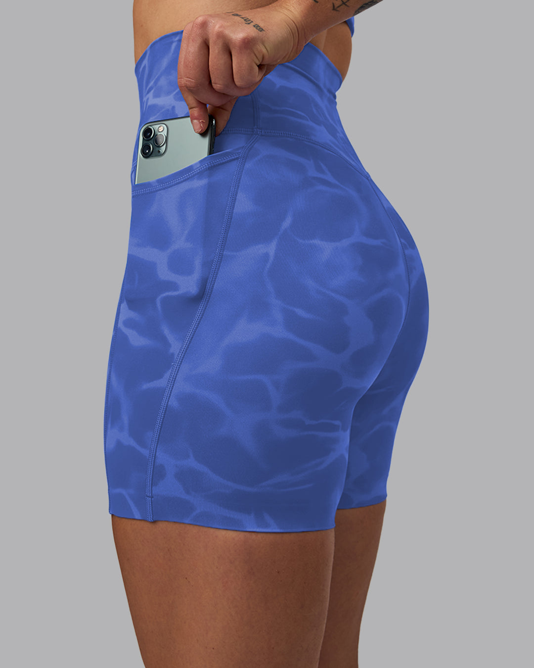 Woman wearing Elixir Ultra High-Rise 6&quot; Short Pockets - Tranquil-Power Cobalt