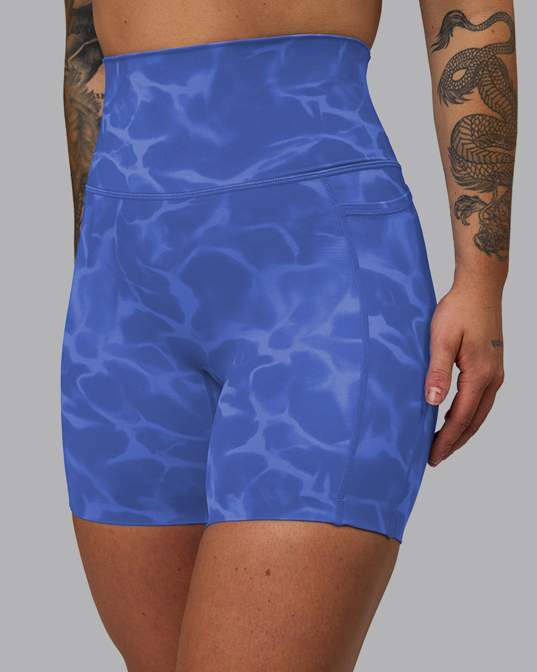 Woman wearing Elixir Ultra High-Rise 6&quot; Short Pockets - Tranquil-Power Cobalt